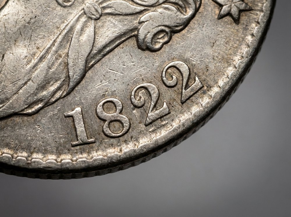 Magnified view of an overdate variety showing the earlier digit visible beneath the punched-over date